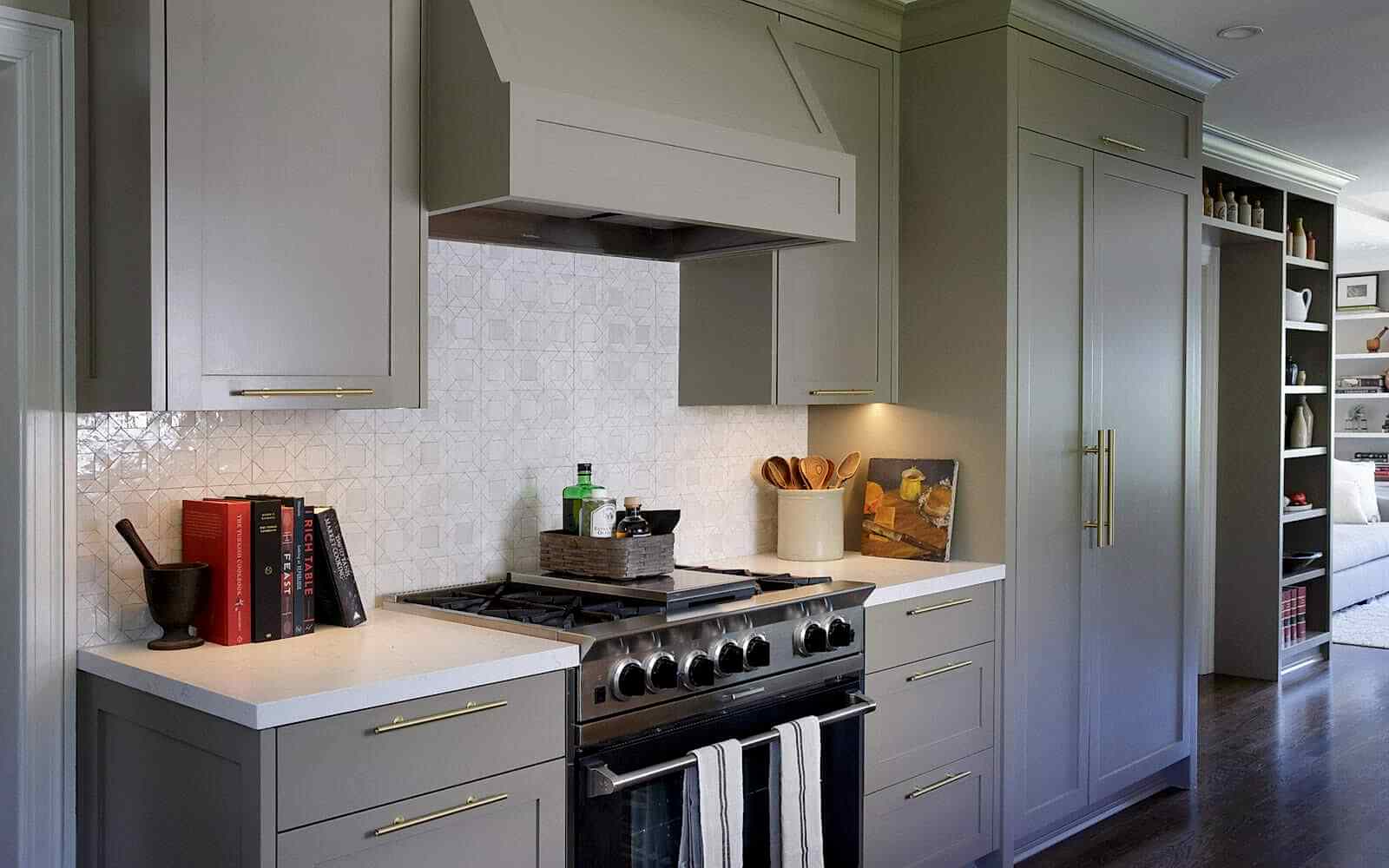 Range with Mosaic House Moroccan tile backsplash, custom painted cabinets, interior design for family in Piedmont